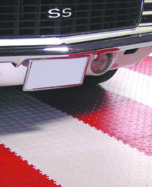 red and white diamond supratile under white car
