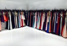 Thumbnail - retail space with white epoxy flooring and many dresses